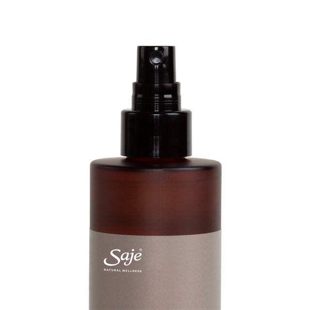 top of Rooms Spray showcasing the spray nozzle on the glass bottle